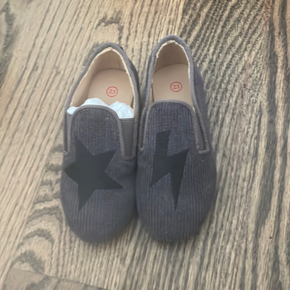 Dark green corduroy loafers for toddler boys.